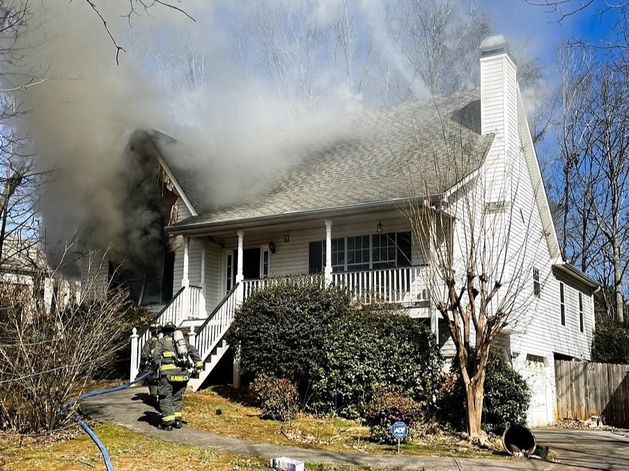 A 60-year-old woman died Sunday after her home off Red Fern Court in Canton caught on fire.