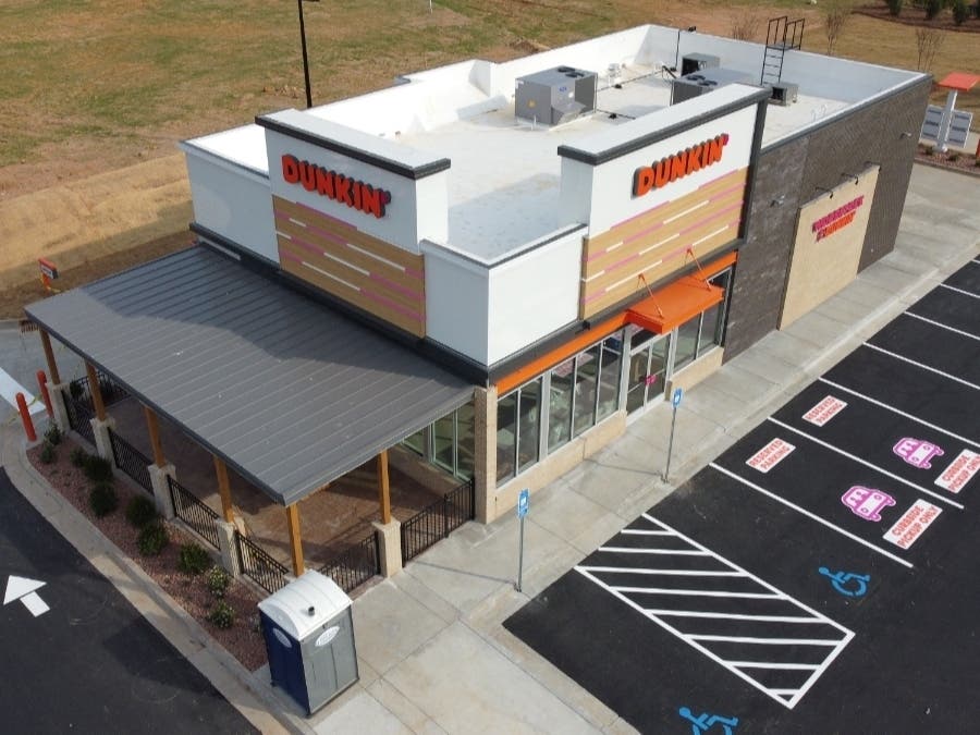 Dunkin’ will open its 1,000th "Next Generation" restaurant in Woodstock on Friday, with the chance to win free coffee for a year.