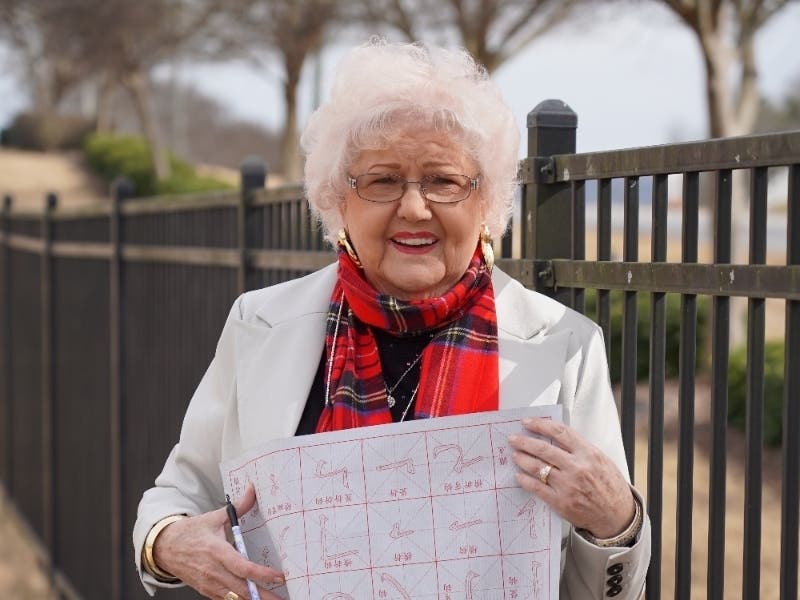 Bartow Education Foundation Executive Director Dot Frasier holds materials purchased by a high school teacher through the teacher grant program.