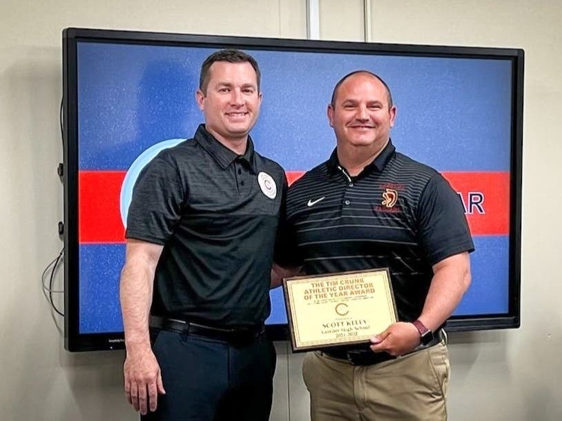 Don Baker and Scott Kelly celebrate the honor.