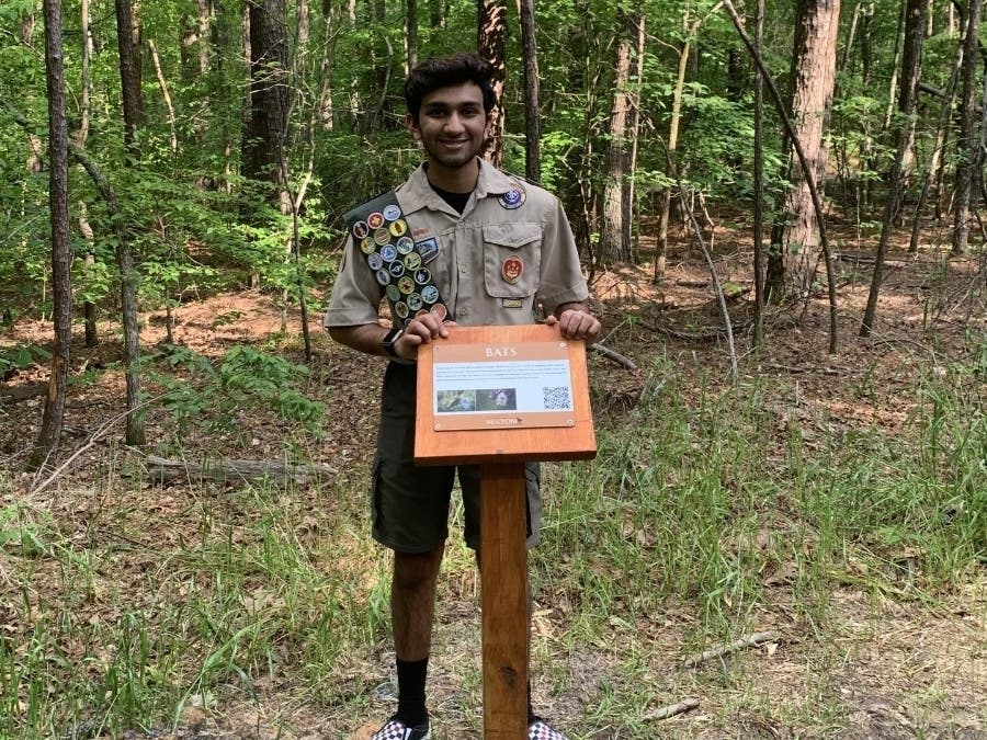 Scout Ronan Chandaria a Milton High sophomore and member of Troop 841, built signs and bases at Providence Park.
