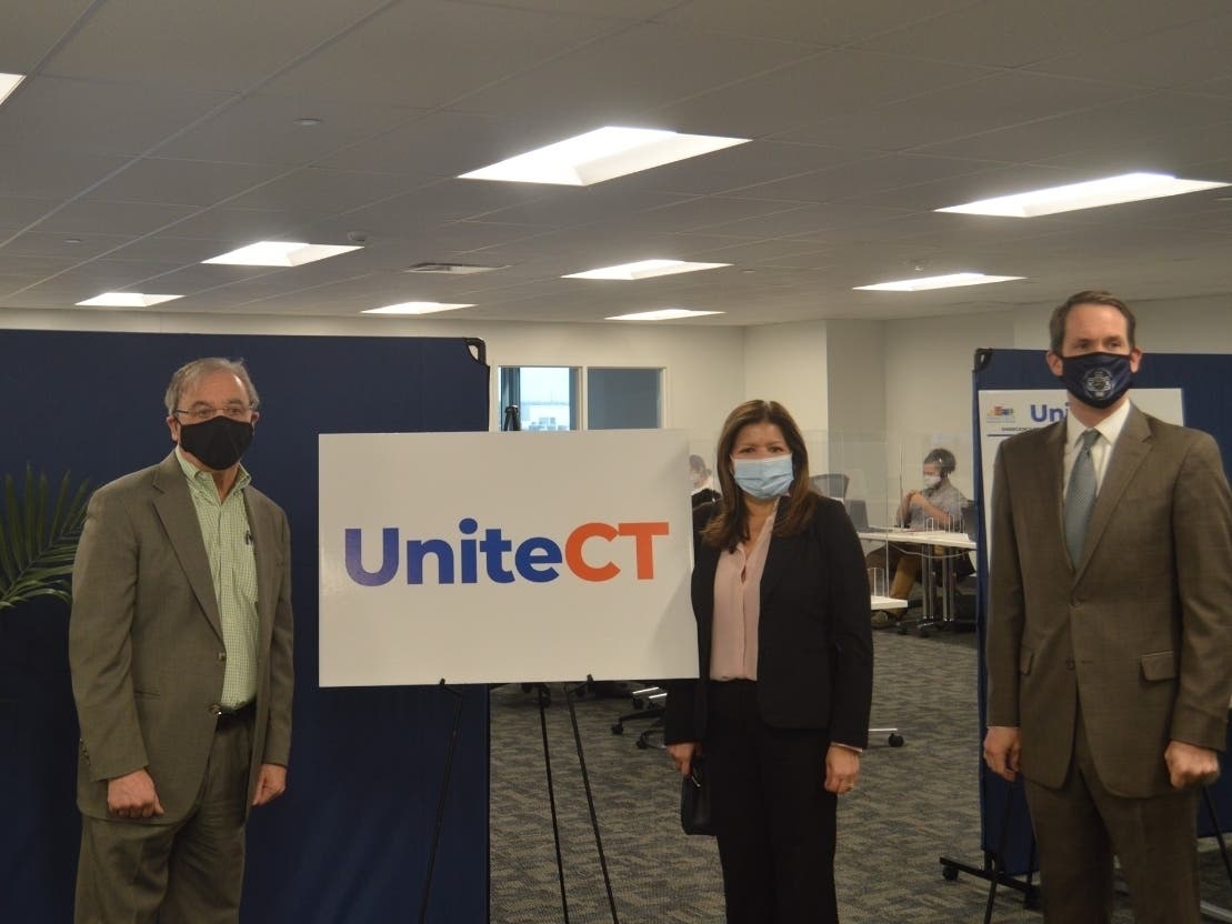 Caption: (from left) Joseph Carbone, president and CEO of The WorkPlace, Connecticut’s Housing Commissioner Seila Mosquera-Bruno and U.S. Rep. Jim Himes, D-CT, at the Bridgeport call center for UniteCT.