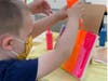 Marla Beth Enowitz, the abstract artist behind Marla Beth Designs, teaches young budding artists at a recent rainbow drip workshop for Westchester Children’s Museum