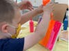 Marla Beth Enowitz, the abstract artist behind Marla Beth Designs, teaches young budding artists at a recent rainbow drip workshop for Westchester Children’s Museum
