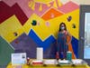 Westchester ‘happy art’ artist Marla Beth Enowitz with her new interactive “Climb Every Mountain” mural at Westchester Children’s Museum.