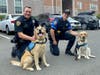 (left to right): City of Rye Police Officers Justin Keeney and Alex Whalen with BluePath dogs Penn and Suzie.