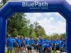 Left to right: Dan Zarro (of Ossining) and BluePath President & CEO Jody Sandler (of Hopewell Junction) cut the ribbon to kick off BluePath Service Dogs’ sixth annual walkathon at FDR State Park in Yorktown Heights. 