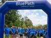 Dan Zarro (of Ossining) and BluePath President & CEO Jody Sandler (of Hopewell Junction) cut the ribbon to kick off BluePath Service Dogs’ sixth annual walkathon at FDR State Park in Yorktown Heights. 
