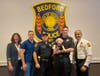 Left to Right: Town of Bedford Supervisor Ellen Calves, Police Officers Mark Montanaro, Joe Sagliano, and Zach Leone, and Police Chief Melvin Padilla with future BluePath service dog Maverick.