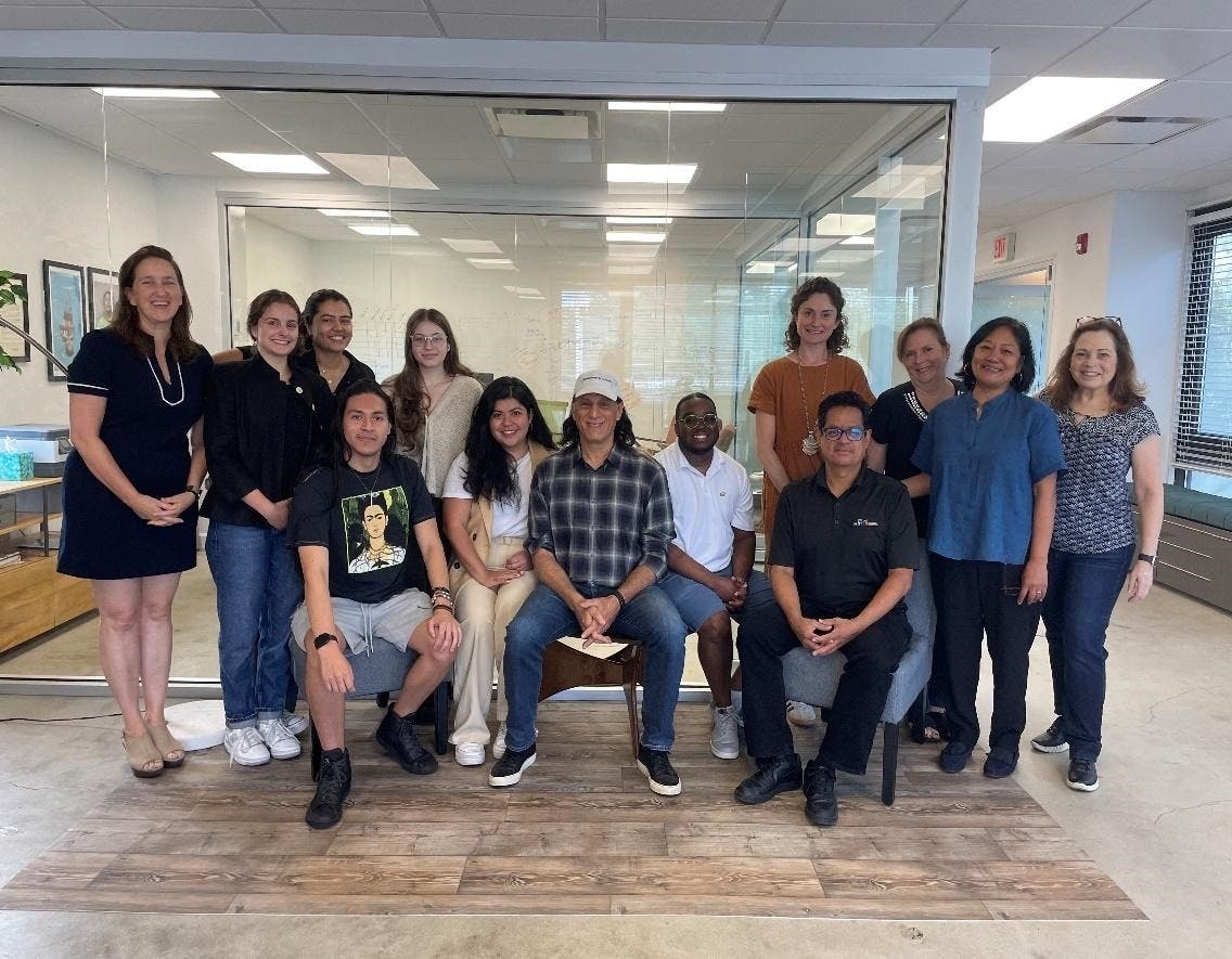 Sandy Wollman, Co-Founder and Managing Director of the Westchester Angels (seated middle) and Margaret Käufer, President of The STEM Alliance (standing immediate left) with staff from The STEM Alliance. 