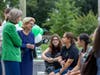 President Cristle Collins Judd and New York State Senator Shelley Mayer chatting with Sarah Lawrence College students.