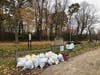 21 Bags of trash removed as well as several large pieces from vehicles