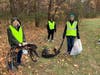 Volunteers pulled many large vehicle parts from the woods along Rand Road