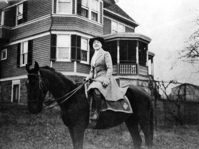 Alice Guy Blaché atop a horse outside her home on Lemoine Avenue near Main Street Fort Lee New Jersey.