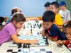 Students learn advanced Chess strategy and tactics