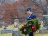 Cadet Staff Sergeant MacKenzie Travers carries wreaths to place on veteran’s graves.  