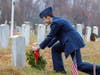 Cadet Airman First Class Tristain Taylor lays wreath in remembrance of veteran.  