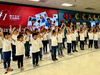Children from CCACC Academy and the Jing Hua Children's Choir delight the audience with the songs "The Oriole" and "Healthy Song".