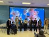 Dr. McGhee (back row, 5th from right) delivering a speech, extending warm wishes for good health and happiness of the elderly members at CCACC Adult Day Healthcare Center.
 