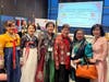 A group photo was taken with Ms. Li-Fang Liu, CCACC Deputy Executive Director (the third from the right), and community representatives dressed in traditional ethnic costumes.