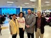 The two guests posed for a photo with Deputy ED Li-Fang C. Liu (far left) and Dr. Huang (far right).