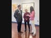 The two councilmembers engage in a discussion with Pearl Shen about artistic concepts.