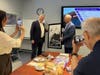 Director Chih-Hsiang Li presented former U.S. Congressman for Maryland David Trone with a photographic artwork from the "Huang Shan (Yellow Mountain) Series" by renowned Chinese photographer Guan Yiming.