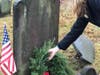A Revolutionary War veteran is honored with a wreath
