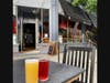 Sidewalk seating on Mass Ave. is set up for al fresco dining.