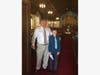Steve Wootton and a young member get ready to usher for the morning service