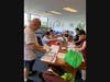 The volunteer members worked together in a fast and efficient manner, dividing tasks seamlessly.