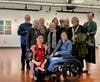 CCACC Executive Director and Art Gallery Director Rita Lewi and CCACC Deputy Executive Director Li-Fang Liu pose with Celeste Lucid Wiser, Julia Sutliff, Mary McCoy (back row, 4th, 5th and 7th respectively from left) and their families and friends.
