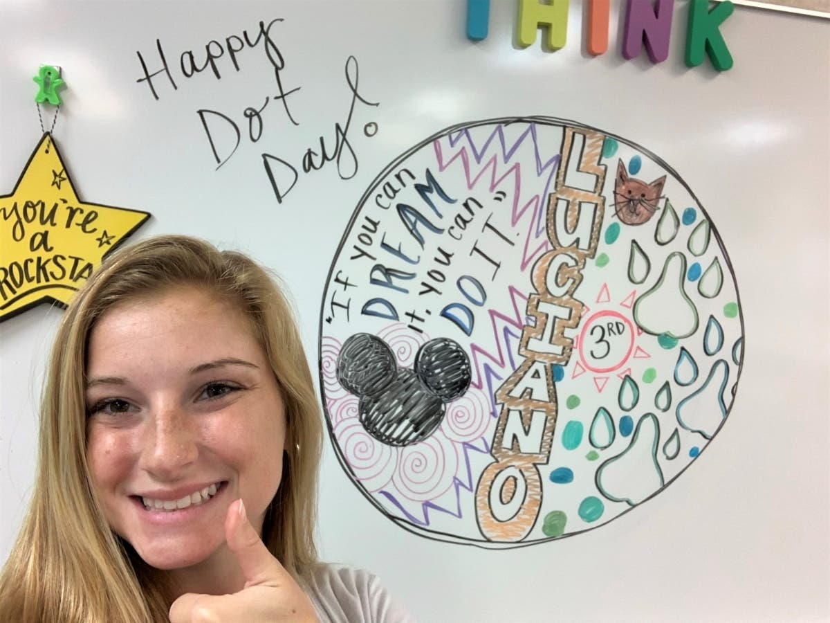 Creekside Elementary School Third Grade Teacher Courtney Luciano poses with a photo of her “dot.” Creekside Elementary School celebrated International Dot Day on Tuesday, September 15, 2020. International Dot Day encourages students to find their strength