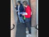 The canvassers are speaking with a community member at Montgomery Club Apartments & Townhomes.