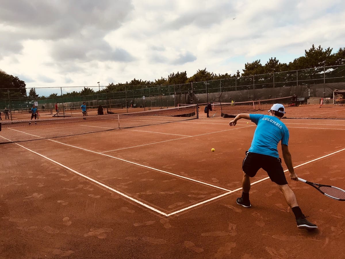 Players rallying on the RCTA Clay Courts.