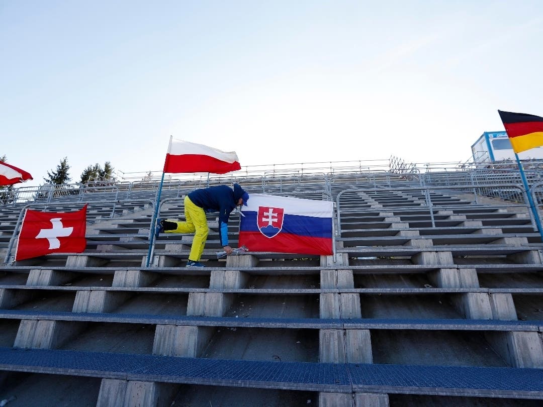 Flags wave amid empty stands Thursday ahead of the women's Biathlon World Cup 7.5 km sprint event in Czech Republic.