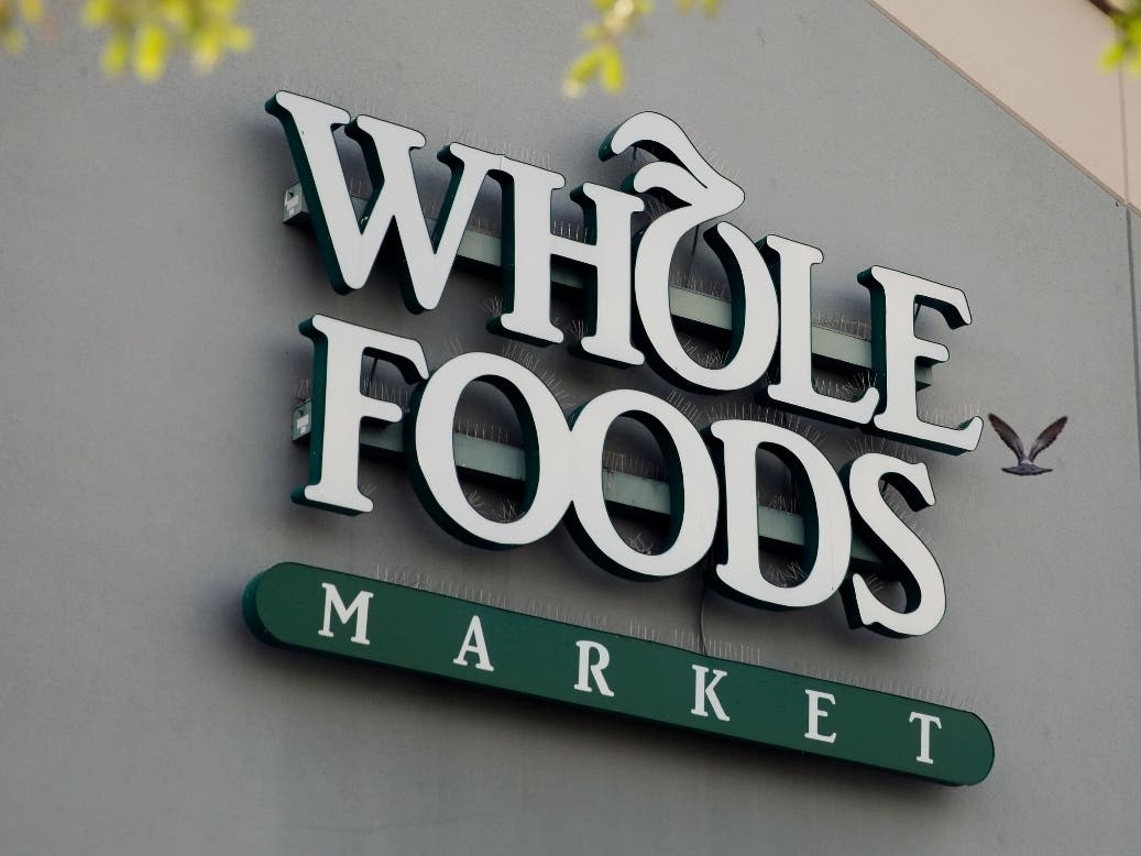 Whole Foods, which is owned by Amazon, has boosted wages for U.S. workers and promised two weeks of paid leave for employees diagnosed with coronavirus or those made to quarantine.
