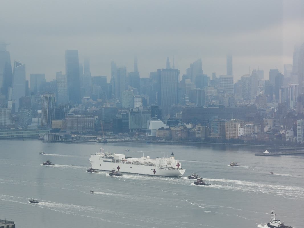 The Navy hospital ship USNS Comfort, with 1,000 beds, enters the New York Harbor Monday morning to help deal with the coronavirus crisis gripping the city's hospitals.