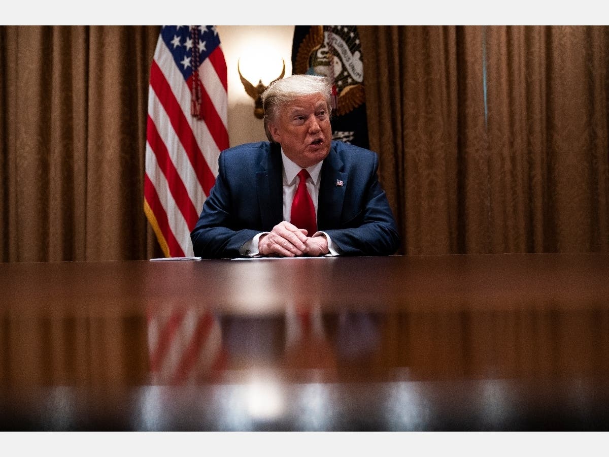 President Donald Trump speaks during a meeting with health care executives in the Cabinet Room of the White House.