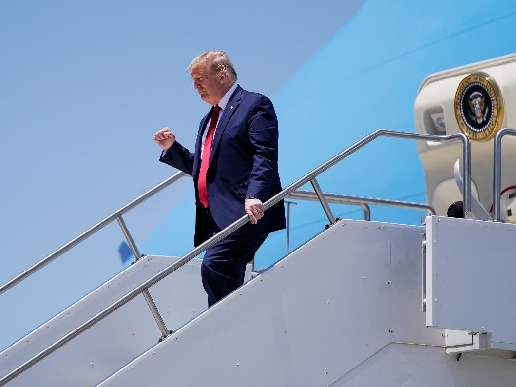 President Donald Trump arrives Tuesday in Phoenix, where he will visit a factory making N95 face masks. 