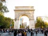 People celebrate the outcome of the 2020 general election near the arch in Washington Square Park. 