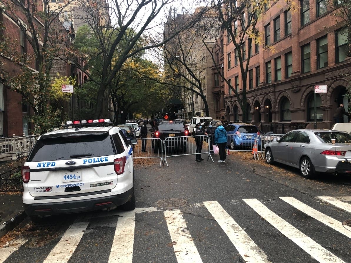 An image of police barricades blocking the block that houses the 20th Precinct on the Upper West Side.