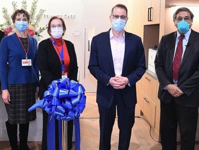 An image of Councilman Mark Levine with members of primary-care practice's leadership team.