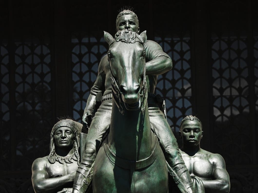 The statue of former President Theodore Roosevelt, who also served as New York state governor, stands in front of the Museum of Natural History on June 22, 2020 in New York City.