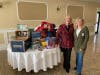 MRCC Vice President Tara Demyanovich and President Sherilyn Przelomski with some of the items donated at the December Women in Business Luncheon