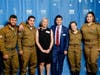 FIDF New England Board Chair and National Board Member Sharon Mishkin; FIDF New England Executive Director Guy Ronen; with IDF soldiers at the FIDF New England Dinner. 