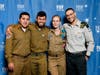 FIDF New England Vice Chair and National Board Member Rosaline Barron, with IDF soldiers at the FIDF New England Dinner.