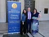 Les Vail celebrates the honor with his daughters, Dana Teague and Lauren Capone