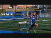 John Gulish carrying the baton in the final leg of the 4X100 Relay race with 75 meters to go. Bunnell went on to capture the 4X100 in a time of 47.6 seconds.