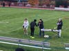 Stratford's Amos Colocho graciously receives his SWC All Conference medal at the awards table following his finish at the 2022 SWC Championship XC race on October 19th 2022
